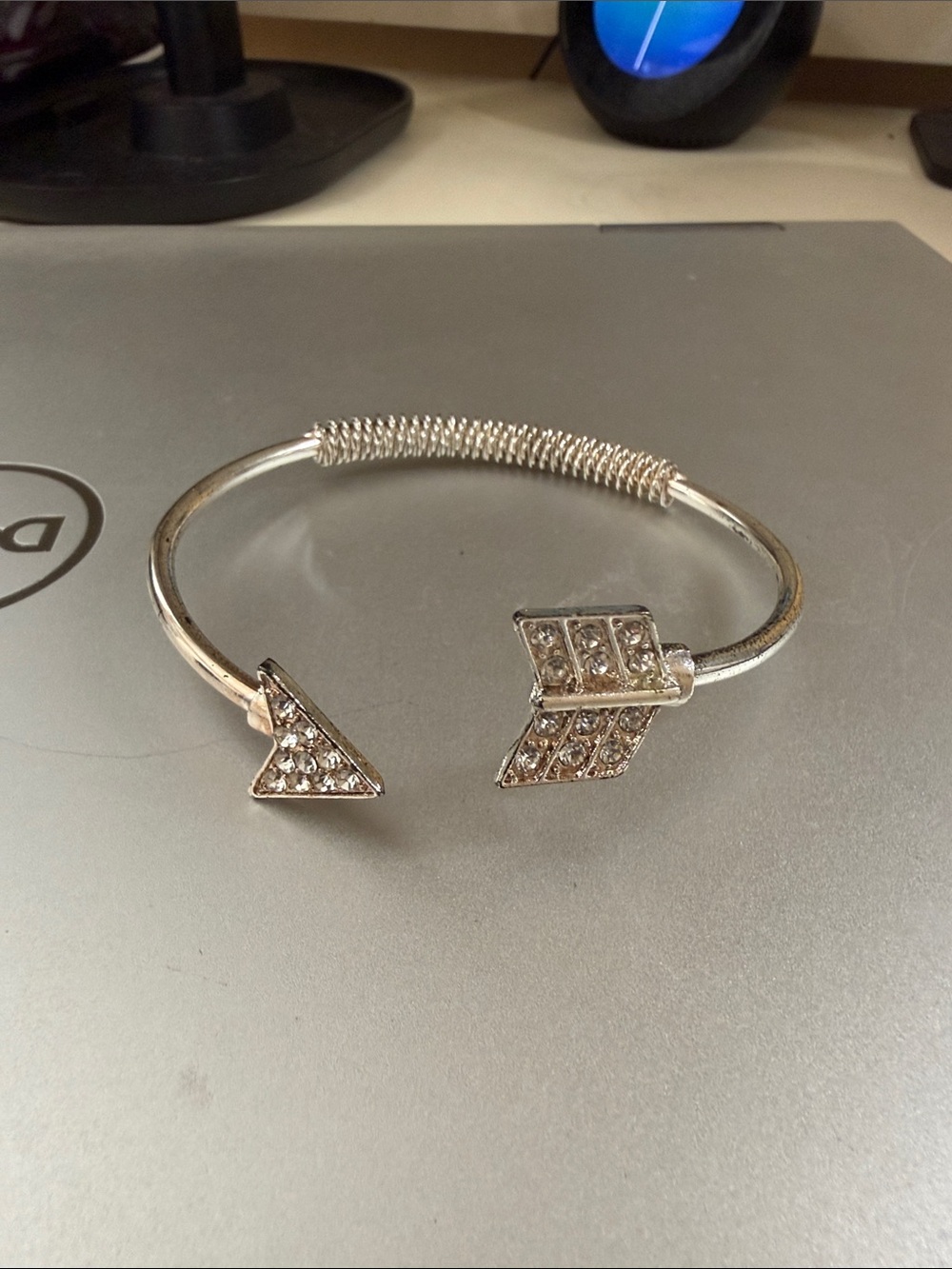 Guess Arrow bangle silver. Never worn . Crystals